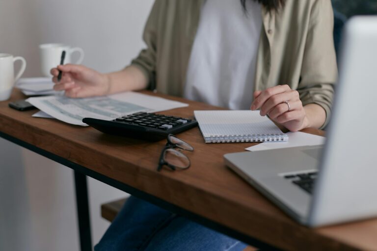Accountant at a desk looking for a job