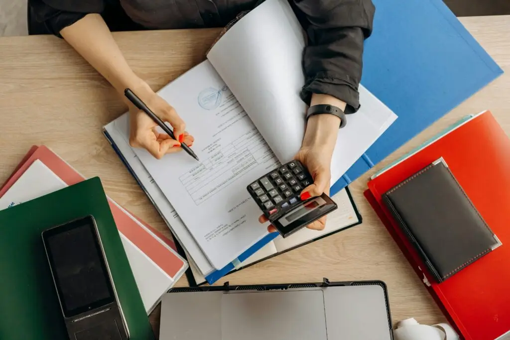 accountant doing work on paper