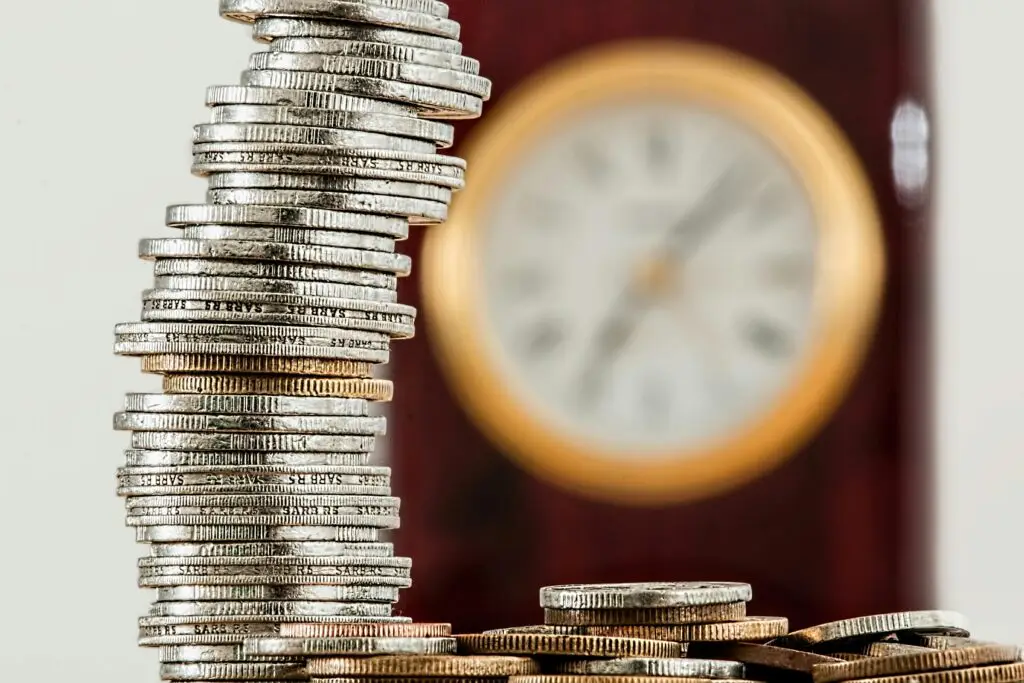 stack of money saved from accounting and finance recruitment