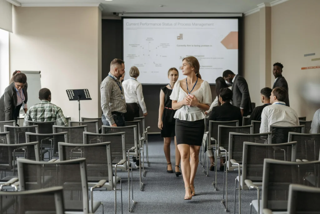 Managers networking at a GTA hiring workshop and process management seminar